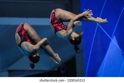 JAKARTA, INDONESIA - AUGUST 18, 2018 : Indonesia Diving Athlete Compete In Women's Synchronised 10m Platform Diving Final On The 2018 Asian Games In Jakarta.