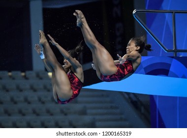 JAKARTA, INDONESIA - AUGUST 18, 2018 : Indonesia Diving Athlete Compete In Women's Synchronised 10m Platform Diving Final On The 2018 Asian Games In Jakarta.