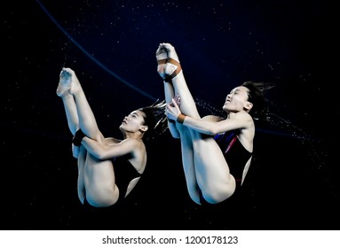 JAKARTA, INDONESIA - AUGUST 18, 2018 : Malaysia Diving Athlete Compete In Women's Synchronised 10m Platform Diving Final On The 2018 Asian Games In Jakarta.