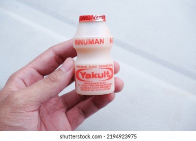 Jakarta, Indonesia - August 28 2022: Yakult Is A Dietary Supplement In The Form Of Probiotic Drinks. Yakult Contains The Good Bacteria Lactobacillus Casei Shirota Strain.