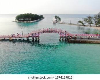 Jakarta, Indonesia - Dec 22, 2019: Aerial Drone Top View Of Pink Love Bridge At Pulau Tidung Island, In Kepulauan Seribu, Jakarta, Indonesia