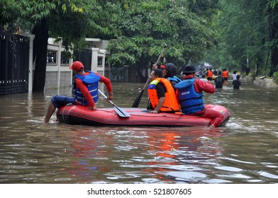 Jakarta, Indonesia - February 10, 2015: Rescue Officers On Patrol To Evacuate Flood Victims In Jakarta - Indonesia