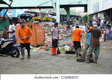 JAKARTA, INDONESIA - February 3, 2019: People Cleaning Street To Make Sure That The Pasar Minggu Market Is Clean For Rubbish So The Visitor Are Comfortable To Shopping At The Traditional Market.