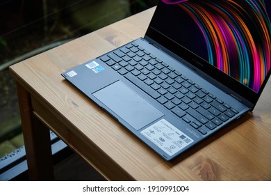 Jakarta, Indonesia - February 6, 2021: The ASUS ZenBook Flip 13 UX363 is 2-in-1 convertible laptop has a new edge-to-edge keyboard design and dual-function touchpad NumberPad 2.0.