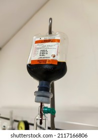 Jakarta, Indonesia - Jan 2022: Close Up Of IV Plastic Bag With Drip Chamber In Recovery Room At Intensive Care Unit Of Hospital With Bokeh Background. No People.