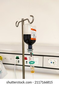 Jakarta, Indonesia - Jan 2022: Close Up Of IV Plastic Bag With Drip Chamber In Recovery Room At Intensive Care Unit Of Hospital With Bokeh Background. No People.