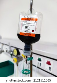 Jakarta, Indonesia - Jan 2022: Close Up Of IV Plastic Bag With Drip Chamber In Recovery Room At Intensive Care Unit Of Hospital With Bokeh Background. No People.