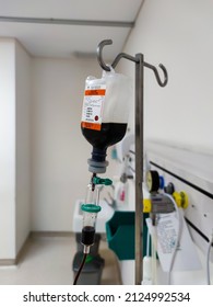 Jakarta, Indonesia - Jan 2022: Close Up Of IV Plastic Bag With Drip Chamber In Recovery Room At Intensive Care Unit Of Hospital With Bokeh Background. No People.