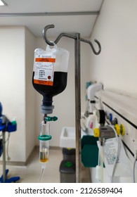 Jakarta, Indonesia - Jan 2022: Close Up Of IV Plastic Bag With Drip Chamber In Recovery Room At Intensive Care Unit Of Hospital With Bokeh Background. No People.