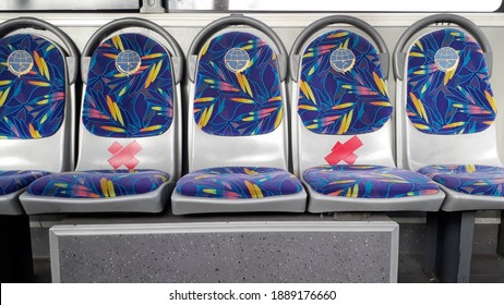 Jakarta, Indonesia - January 8th, 2021: The Empty Seats On The Transjakarta Bus. The Red Cross Tape On Seat Means Passenger Not Allowed To Sit On It