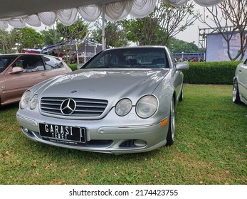 Jakarta Indonesia. July 3, 2022 : Display of vintage and modified cars at the  Automotive Exhibition in Jakarta. Old grey silver mercedes benz with big eyes