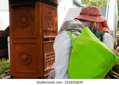 Jakarta, Indonesia - July 30, 2022: People Pay Attention, Have A Look At The Old Post Box In Jakarta Post Office