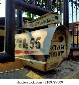 Jakarta, Indonesia - July 31, 2022: An Indonesian Letter Box Stick On A Concrete Fence Or Wall Of A House Gate. Translation: 