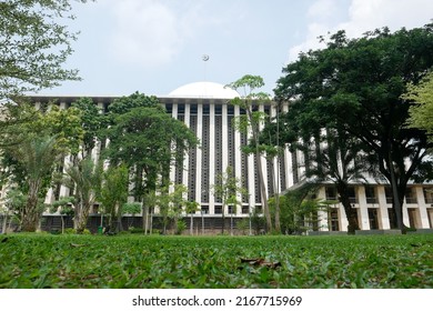 Jakarta, Indonesia - June 10 2022: Istiqlal Grand Mosque Seen From The Side. There Is A Green Garden With A Nice View. Suitable For Religious Tourism In The City.