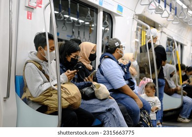 Jakarta, Indonesia | June 10 2023 | Jakarta MRT train passengers - Shutterstock ID 2315663775