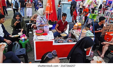 Jakarta, Indonesia - June 13, 2022:  Egg Crust (kerak Telor) Traders At The Jakarta Fair 2022.                               