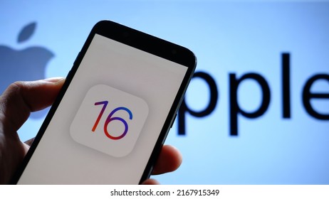 Jakarta, Indonesia - June 14, 2022: IOS 16 Logo Displayed On A Smartphone With An Apple Logo In The  Background