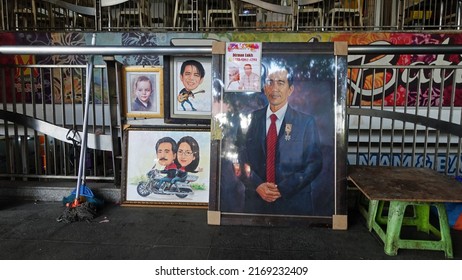 Jakarta, Indonesia - June 18, 2022: Painting a portrait of President Jokowi.                               