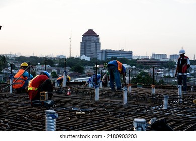 Jakarta, Indonesia - June 21st 2020: Construction Workers Are Installing Box Girder Rebar For Reinforcement In Site Construction Project.