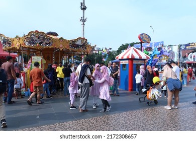 Jakarta, Indonesia - June 26 2022 : Family Having Fun At Jakarta Fair Playground 