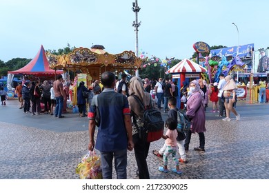 Jakarta, Indonesia - June 26 2022 : Family Having Fun At Jakarta Fair Playground 