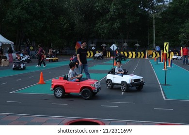 Jakarta, Indonesia - June 26 2022 : Children Driving Toy Car At Jakarta Fair 