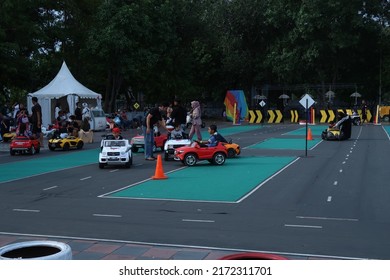 Jakarta, Indonesia - June 26 2022 : Children Driving Toy Car At Jakarta Fair 