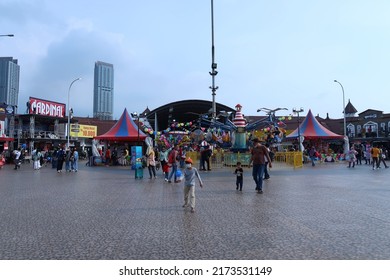 Jakarta, Indonesia - June 26 2022 : Family Having Fun At Jakarta Fair Playground 