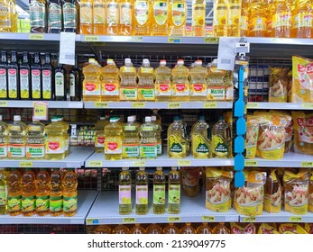 Jakarta, Indonesia - March 2022: Variety Of Cooking Oil Product Arranged On Shelf In Supermarket For Consumer To Buy. No People.