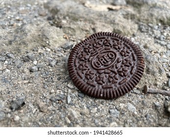 Jakarta, Indonesia - March 23rd, 2021 Oreo Falling On The Sandy Ground