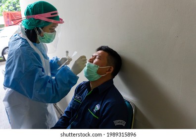 Jakarta, Indonesia - March 30, 2021: An Indonesian Government Employee Was Swabbed For Covid-19 Antigen Test