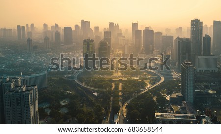 JAKARTA, Indonesia. May 12, 2017: Aerial view under overpass in the city. Shot at sunset time