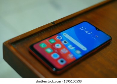 Jakarta, Indonesia - May 12, 2019: The OPPO A5s Android smartphone has a 6.2-inch IPS LCD display panel with 720 x 1520 HD+ resolution and a waterdrop-style notch at the top. - Shutterstock ID 1395130538