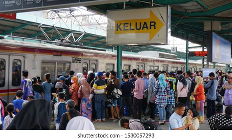 Jakarta, Indonesia - May 16, 2018: Crowd Indonesian People Using KRL Commuter Train At Manggarai Railway Station In Jakarta