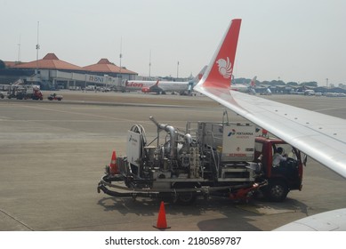 Jakarta, Indonesia - May, 2011: The Refueling Car Will Do The Jet Fuel Or Avtur Refueling For The Lion Air Plane