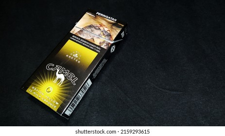 Jakarta, Indonesia - May 2022 : Cigarette Packaging With Cancer Illustrations, Used In All Cigarette And Tobacco Products.