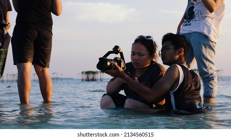 Jakarta, Indonesia - May 28, 2019: Some Film Crew Are Shooting A Scene On A Beach