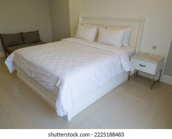 Jakarta, Indonesia. Nov 5, 2022. A Bedroom With The White Bed And Another Interiors At A Hotel Jakarta In The Afternoon. No People.