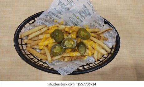 Jakarta, Indonesia - November 6, 2019 : Cheesy French Fries Is One Of The Favourite Product From Wingstop. Wingstop Is Popular Fried Chicken Brand.