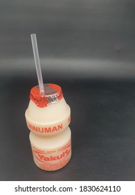 Jakarta, Indonesia -  Oct 10,  2020: Yakult Fermented Milk Drink On White Isolated Background. Healthy Probiotic Drink With The Bacteria Strain Lactobacillus Paracasei Shirota