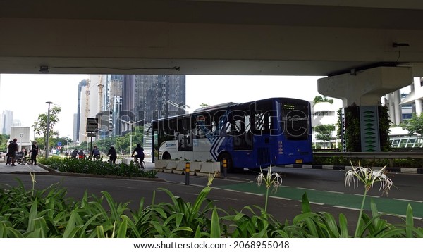 Jakarta,\
Indonesia - Oct, 24, 2021: Transjakarta is the first Bus Rapid\
Transit transportation system in Southeast and South Asia,\
operating since 2004 in Jakarta, Indonesia.\
