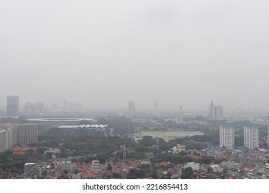 Jakarta, Indonesia. 
October 19, 2022. 

An Example Of A Bad Quality Image, Not Sharp, Blurry, Noise And Gray Sky Of The Jakarta's Aerial City Scape View Due To The Thick Fog Of Air Pollution.