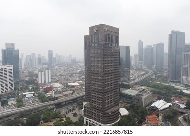 Jakarta, Indonesia. 
October 19, 2022. 

An Example Of A Bad Quality Image, Not Sharp, Blurry, Noise And Gray Sky Of The Jakarta's Aerial City Scape View Due To The Thick Fog Of Air Pollution.