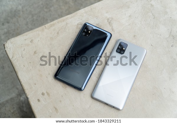 Jakarta,\
Indonesia - October 29, 2020: Comparing the mid-range smartphone\
Samsung Galaxy M51 Vs. Samsung Galaxy A71.\
