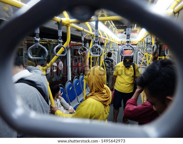 Jakarta, Indonesia : People of Jakarta
using Busway, a single mini bus as public transportation in Blok M
terminal, Jakarta
(07/2017).

