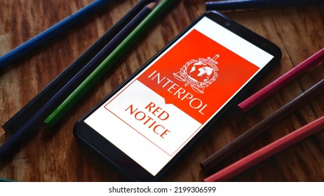 Jakarta, Indonesia - September 07,2022:  Interpol Red Notice Logo Displayed On Smartphone. Interpol Red Notice Is Closest Instrument To An International arrest Warrant in Use Today.