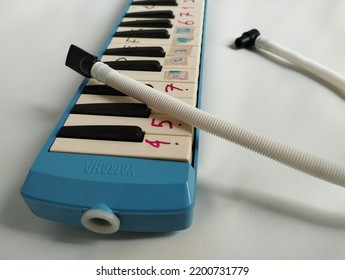 Jakarta, Indonesia - September 12, 2022: Pianica Or Melodica Musical Instrument Isolated On White Background. High Angle Shot. Selective Focus. 