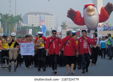 Jakarta, Indonesia - September 23, 2018: Police With Wheels Participate In Enlivening The Asian Para Games Momo Parade.