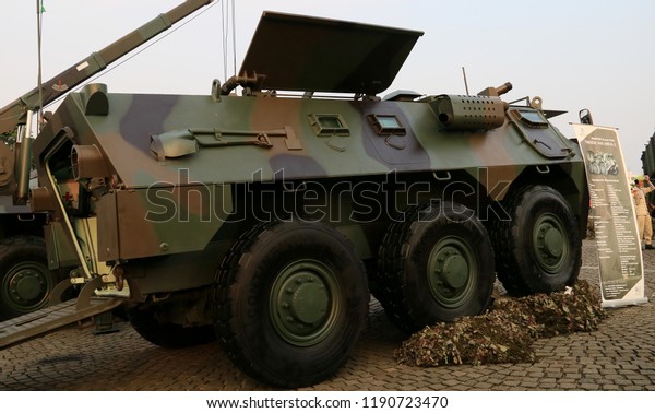 Jakarta, Indonesia - September 28, 2018: Anoa 6x6,\
armoured personnel carrier developed by PT Pindad at the Indonesian\
Army primary weapons defense system\'s exhibition at the National\
Monument. 