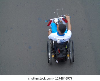 Jakarta, Indonesia - September 30, 2018: Disabilities And Athletes Participate In Enlivening The Asian Para Games Torch Relay 2018.